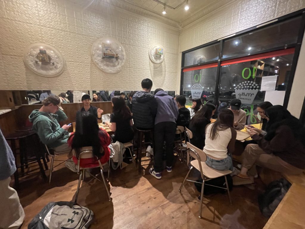 A photo of people playing games at Molly's Cupcakes.