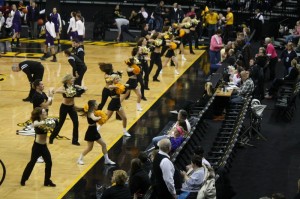 The dance team(Spirit Squad) and the cheerleaders dancing to the fight song to start the game.