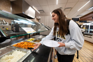 A student grabbing food.