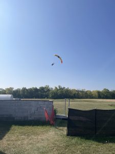 A picture of a parachute landing at the drop zone.
